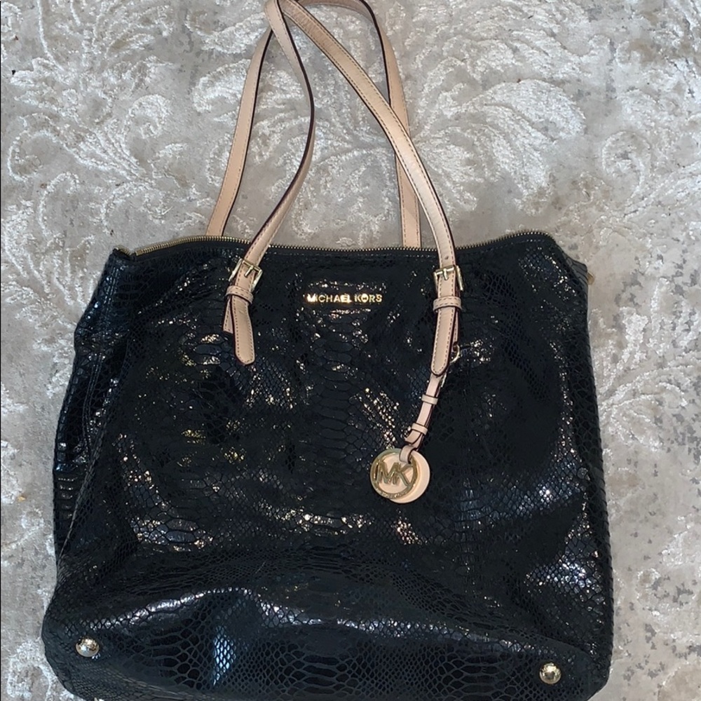 Black snake skinned pattern Michael Kors bag